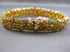 ESTATE WIDE 25.30CT WHITE FANCY NATURAL YELLOW DIAMOND 18K GOLD TENNIS BRACELET