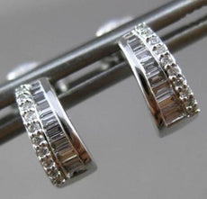 ESTATE .23CT BAGUTTE & ROUND DIAMOND 14KT WHITE GOLD UMBRELLA POST EARRINGS