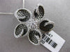 ESTATE LARGE 1.0CT DIAMOND 18KT WHITE & BLACK GOLD FLOWER STAR FLOATING PENDANT