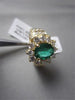 ESTATE 3.34CT DIAMOND & AAA COLOMBIAN EMERALD 14KT YELLOW GOLD FLOWER HALO RING