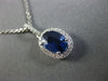 ESTATE 1.21CT DIAMOND & AAA SAPPHIRE 14KT WHITE GOLD OVAL HALO FLOATING PENDANT
