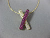 ESTATE .42CT DIAMOND & AAA RUBY 14KT YELLOW GOLD CLASSIC X LOVE FLOATING PENDANT