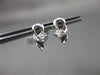 ESTATE .25CT ROUND DIAMOND 18KT WHITE GOLD 3D SOLITAIRE RIBBON STUD EARRINGS