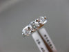 ESTATE .91CT DIAMOND 14KT WHITE GOLD 3D PAST PRESENT FUTURE TENSION RING #14161