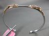 ESTATE .87CT WHITE & PINK DIAMOND 18K WHITE & ROSE GOLD INFINITY BANGLE BRACELET