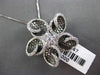 ESTATE LARGE 1.0CT DIAMOND 18KT WHITE & BLACK GOLD FLOWER STAR FLOATING PENDANT