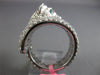 ESTATE LARGE 4.68CT DIAMOND & AAA EMERALD 18KT WHITE GOLD PAVE PANTHER FUN RING