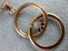 ESTATE LARGE .19CT DIAMOND 18KT ROSE GOLD DOUBLE CIRCLE FLOWER LOVE KNOT PENDANT