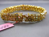 ESTATE WIDE 25.30CT WHITE FANCY NATURAL YELLOW DIAMOND 18K GOLD TENNIS BRACELET