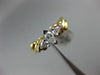 ESTATE .60CT PEAR & MARQUISE DIAMOND PLATINUM & 18KT YELLOW GOLD ENGAGEMENT RING