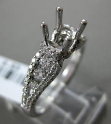 ESTATE .63CT DIAMOND 18KT WHITE GOLD 3D GRADUATING SEMI MOUNT ENGAGEMENT RING