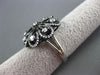 ANTIQUE LARGE 1.14CT DIAMOND 18KT WHITE & BLACK GOLD ETOILE FLOWER FUN RING