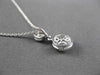 ESTATE SMALL .10CT DIAMOND 14KT WHITE GOLD MILGRAIN CIRCULAR FLOATING PENDANT