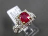 ANTIQUE 2.21CT DIAMOND & AAA RUBY 18KT TWO TONE GOLD INFINITY ENGAGEMENT RING