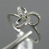 ESTATE .12CT DIAMOND 14KT WHITE GOLD 3D FLOWER LOVE KNOT FUN FRIENDSHIP RING