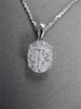 ESTATE .40CT DIAMOND 18KT WHITE GOLD FLOATING CLUSTER FILIGREE OVAL PENDANT