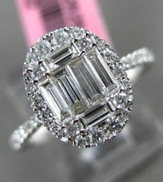 ESTATE LARGE .69CT ROUND & BAGUETTE DIAMOND 18KT WHITE GOLD OVAL ENGAGMENT RING