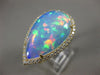 ESTATE EXTRA LARGE 8.13CT DIAMOND & AAA OPAL 14KT YELLOW GOLD CLASSIC HALO RING
