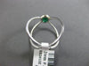 LARGE .56CT DIAMOND & AAA COLOMBIAN EMERALD 14K WHITE GOLD HALO CRISS CROSS RING