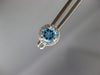ESTATE 1.17CT DIAMOND & AAA BLUE TOPAZ 14KT WHITE GOLD ROUND HALO STUD EARRINGS