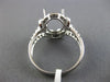 ESTATE LARGE .80CT DIAMOND 14KT WHITE GOLD OVAL HALO SEMI MOUNT ENGAGEMENT RING