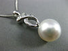 ESTATE LARGE .13CT DIAMOND & SOUTH SEA PEARL 18K WHITE GOLD 3D LOVE KNOT PENDANT