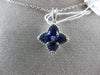 ESTATE .76CT DIAMOND & AAA SAPPHIRE 18KT WHITE GOLD FLOWER STAR FLOATING PENDANT