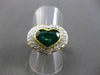 ANTIQUE PLATINUM & 18KT Y GOLD 4.55CT DIAMOND & EMERALD HEART ENGAGEMENT RING