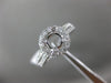 ESTATE .69CT DIAMOND 14KT WHITE GOLD FOUR PRONG HALO SEMI MOUNT ENGAGEMENT RING