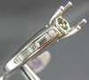 ESTATE .72CT ROUND & BAGUETTE CUT DIAMOND PLATINUM 3D SEMI MOUNT ENGAGEMENT RING