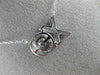 ESTATE .15CT DIAMOND 14K WHITE GOLD 3D DANCING DIAMOND XO FLOATING LOVE NECKLACE