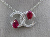 ESTATE 1.26CT DIAMOND & AAA RUBY 14KT WHITE GOLD CIRCLE OF LIFE FLOATING PENDANT