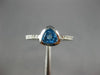 ESTATE .65CT DIAMOND & AAA TRILLION CUT BLUE TOPAZ 14K WHITE GOLD BEZEL FUN RING