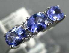 1.05CT DIAMOND & AAA TANZANITE 14KT WHITE GOLD 3D OVAL & ROUND ANNIVERSARY RING