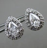 ESTATE .85CT DIAMOND 14KT WHITE GOLD 3D PEAR SHAPE CLASSIC HALO STUD EARRINGS