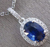 ESTATE 1.21CT DIAMOND & AAA SAPPHIRE 14KT WHITE GOLD OVAL HALO FLOATING PENDANT