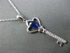 ESTATE .45CT DIAMOND & SAPPHIRE 14KT WHITE GOLD KEY TO MY HEART FLOATING PENDANT