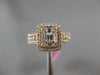 ESTATE LARGE 1.13CT ROUND & BAGUETTE DIAMOND 18KT ROSE GOLD HALO ENGAGEMENT RING