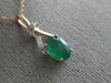 ESTATE .86CT DIAMOND & AAA EMERALD 14KT ROSE GOLD 3D CLASSIC LOVE KNOT PENDANT
