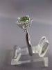 ESTATE 1.51CT DIAMOND & PERIDOT 14KT WHITE GOLD 3D ROUND HALO FRIEDNSHIP RING