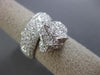 ESTATE LARGE 4.68CT DIAMOND & AAA EMERALD 18KT WHITE GOLD PAVE PANTHER FUN RING