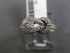 ESTATE .25CT DIAMOND 14KT WHITE GOLD 3D FILIGREE LOVE KNOT BELT SOLITAIRE RING