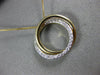ESTATE .20CT DIAMOND 14KT YELLOW GOLD ROUND CIRCULAR LOVE KNOT FLOATING PENDANT