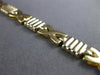 ESTATE 14KT WHITE & YELLOW GOLD 3D HANDCRAFTED X SHAPE LOVE BRACELET #22722