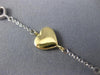 ESTATE LONG TIFFANY & CO. 18K WHITE & YELLOW GOLD FLOATING HEART BRACELET #23095