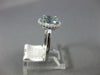 ESTATE 1.22CT DIAMOND & AAA OVAL AQUAMARINE 14KT WHITE GOLD HALO ENGAGEMENT RING