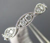 ESTATE .50CT DIAMOND 14KT WHITE GOLD 3D INFINITY 3/4TH ETERNITY ANNIVERSARY RING
