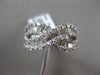 ESTATE 1.99CT BAGUETTE DIAMOND 18KT WHITE GOLD 3D CRISS CROSS INFINITY LOVE RING