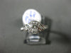 ESTATE .54CT ROUND & BAGUETTE DIAMOND 18K WHITE GOLD 3D INFINITY ENGAGEMENT RING