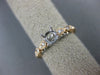 ESTATE .20CT DIAMOND 14KT WHITE & ROSE GOLD OPEN FILIGREE FLOWER ENGAGEMENT RING